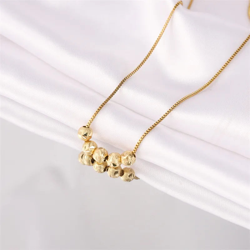 Halskette für Damen ⎜ Vergoldete Kette mit glänzenden Kugelanhängern für stilvolle Alltags- und Business-Looks