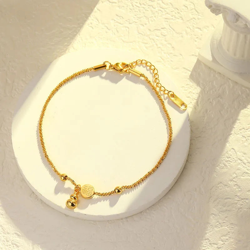 Kette für Damen ⎜ Vergoldete Kette mit Glückssymbol und Kürbisanhänger für traditionelle und stilvolle Looks