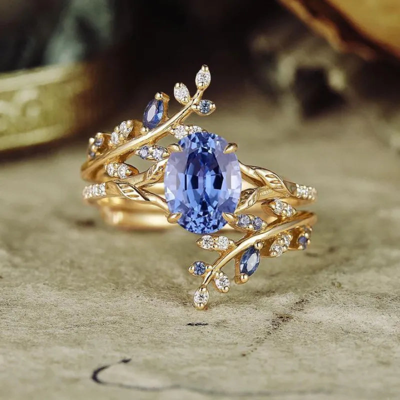Zirkonia Damenring im Vintage-Stil ⎜ Vergoldeter Ring mit grünem Blätterdesign und funkelndem Mittelstein