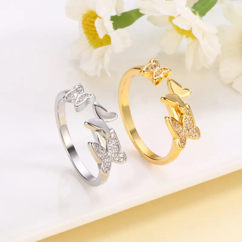 Damenring mit Schmetterlingen ⎜ Filigraner Zirkonia-Ring in Gold oder Silber für einen eleganten und verspielten Look