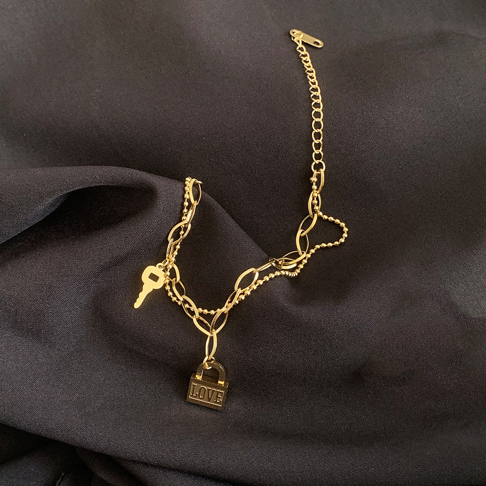 Halskette für Damen ⎜ Vergoldete Kette mit Schloss- und Schlüsselanhänger