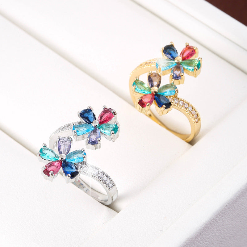 Damenring mit bunten Zirkonia ⎜ Vergoldeter Ring in Blumenform für farbenfrohe Akzente und eleganten Stil