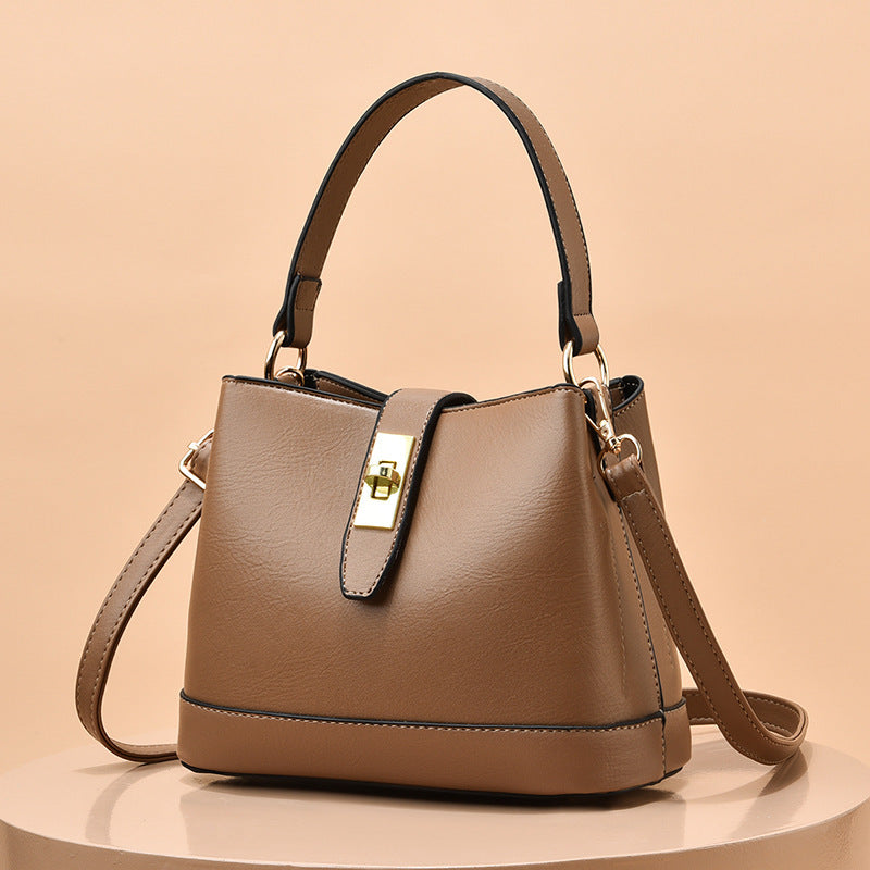 Schultertasche für Damen ⎜ Elegante Umhängetasche mit Drehverschluss und farblich abgesetzten Details