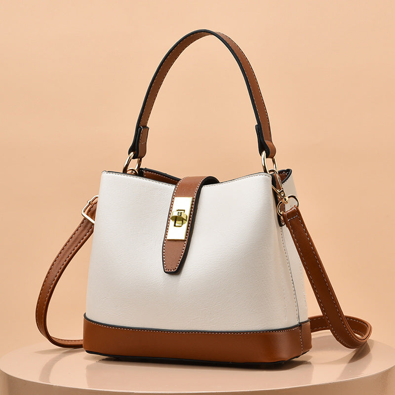 Schultertasche für Damen ⎜ Elegante Umhängetasche mit Drehverschluss und farblich abgesetzten Details