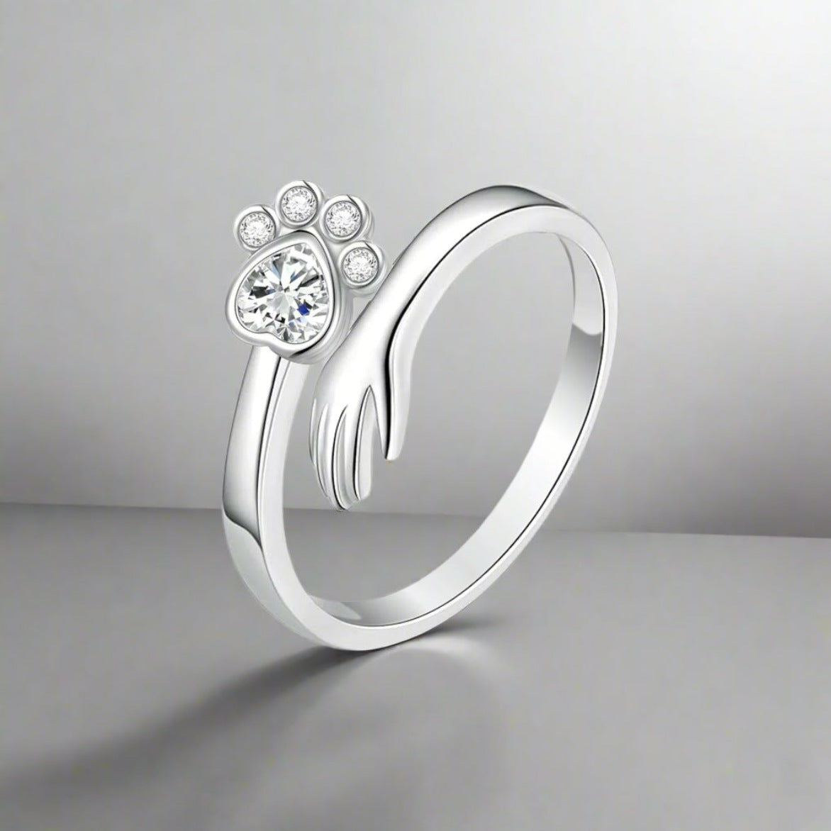 Silberring mit Katzenpfote ⎜ Verstellbarer Damenring mit niedlichem Pfoten-Design und funkelndem Zirkonia