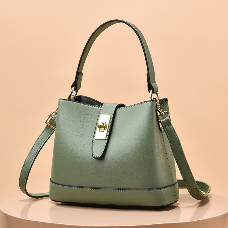 Schultertasche für Damen ⎜ Elegante Umhängetasche mit Drehverschluss und farblich abgesetzten Details