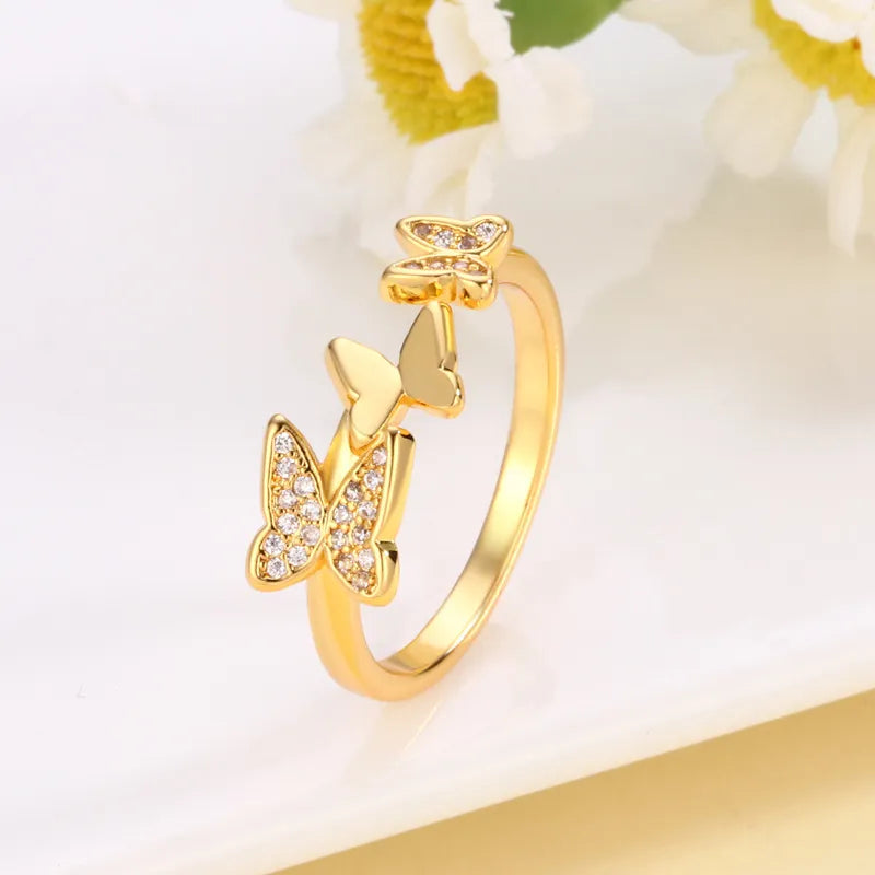 Damenring mit Schmetterlingen ⎜ Filigraner Zirkonia-Ring in Gold oder Silber für einen eleganten und verspielten Look