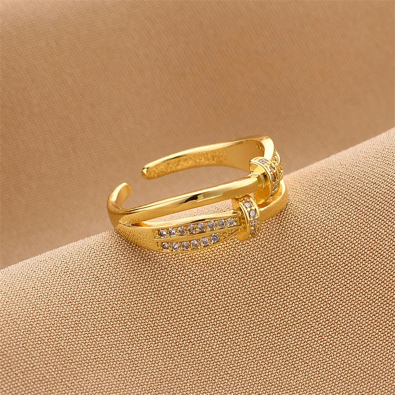 Ring in Goldoptik mit Zirkonia ⎜ Verstellbarer Bandring mit elegantem Schleifen-Design für stilvolle Auftritte
