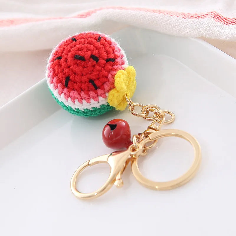 Donut Anhänger aus Wolle ⎜ Handgehäkelter Taschenanhänger mit Glocke für den Rucksack