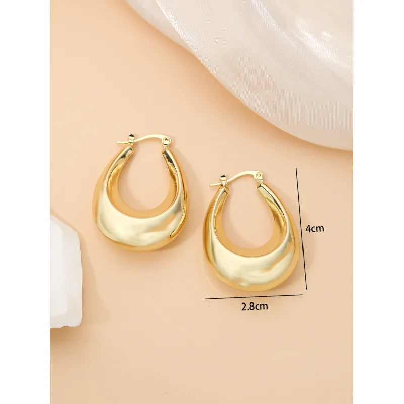 Ovalförmiger Ohrschmuck in Goldoptik ⎜ Glänzendes Design für auffällige und stilvolle Momente