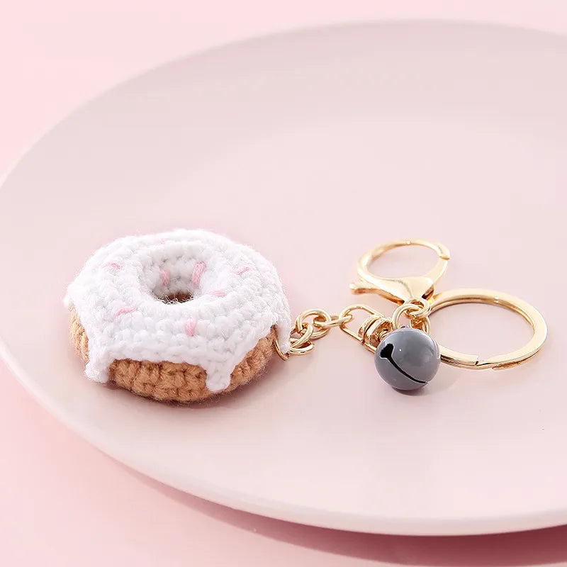 Donut Anhänger aus Wolle ⎜ Handgehäkelter Taschenanhänger mit Glocke für den Rucksack