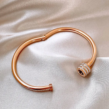 Roségoldener Damenarmreif ⎜ Elegantes Design mit Zirkonia und praktischem Klappverschluss