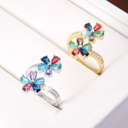 Damenring mit bunten Zirkonia ⎜ Vergoldeter Ring in Blumenform für farbenfrohe Akzente und eleganten Stil