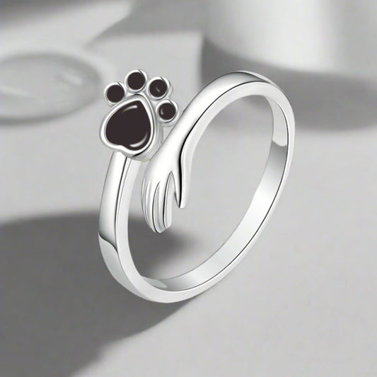 Silberring mit Katzenpfote ⎜ Verstellbarer Damenring mit niedlichem Pfoten-Design und funkelndem Zirkonia