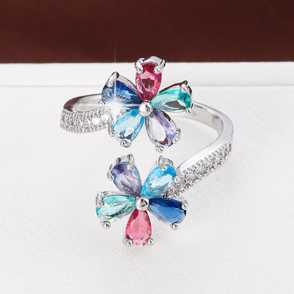 Damenring mit bunten Zirkonia ⎜ Vergoldeter Ring in Blumenform für farbenfrohe Akzente und eleganten Stil