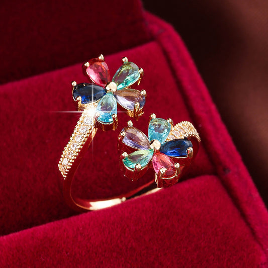 Damenring mit bunten Zirkonia ⎜ Vergoldeter Ring in Blumenform für farbenfrohe Akzente und eleganten Stil