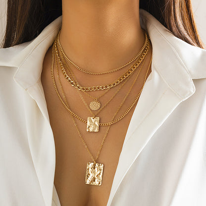 Ketten-Set für Damen ⎜ Mehrlagige Halsketten im Gold-Look mit strukturierten Anhängern für trendige Outfits