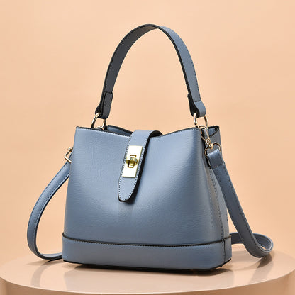 Schultertasche für Damen ⎜ Elegante Umhängetasche mit Drehverschluss und farblich abgesetzten Details
