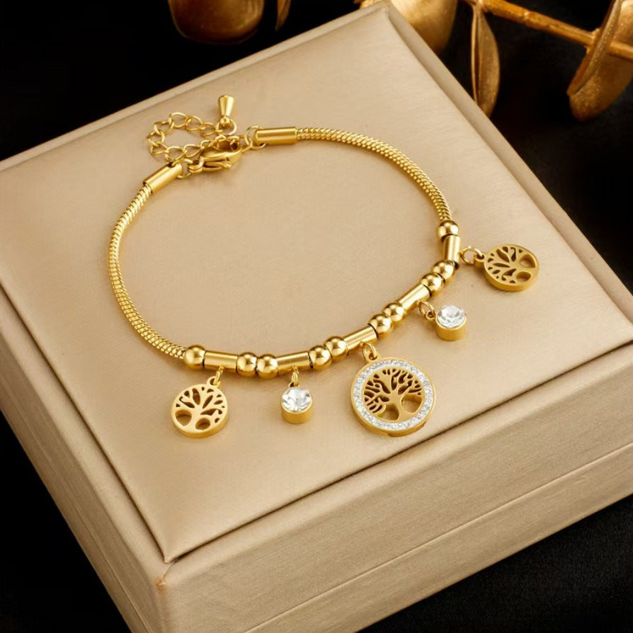 Symbolisches Damenarmband mit Lebensbaum ⎜ Vergoldeter Look mit Zirkonia für eine elegante Botschaft