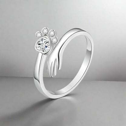 Silberring mit Katzenpfote ⎜ Verstellbarer Damenring mit niedlichem Pfoten-Design und funkelndem Zirkonia