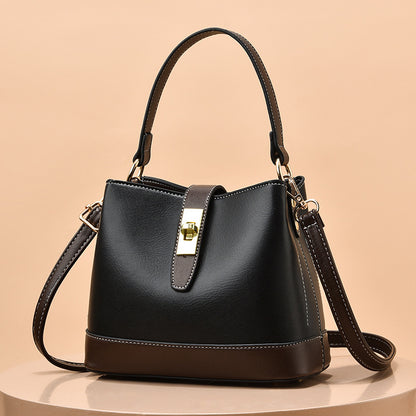 Schultertasche für Damen ⎜ Elegante Umhängetasche mit Drehverschluss und farblich abgesetzten Details