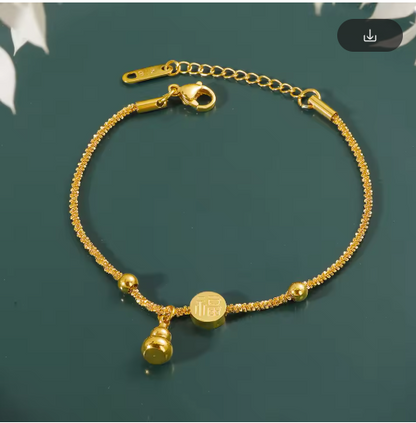 Kette für Damen ⎜ Vergoldete Kette mit Glückssymbol und Kürbisanhänger für traditionelle und stilvolle Looks