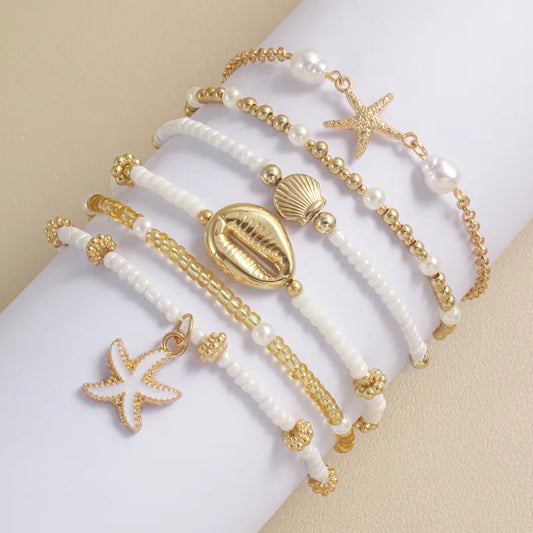 Sommerliches Armband-Set ⎜ Muschel- und Seesternmotive für lässige Looks mit maritimer Note