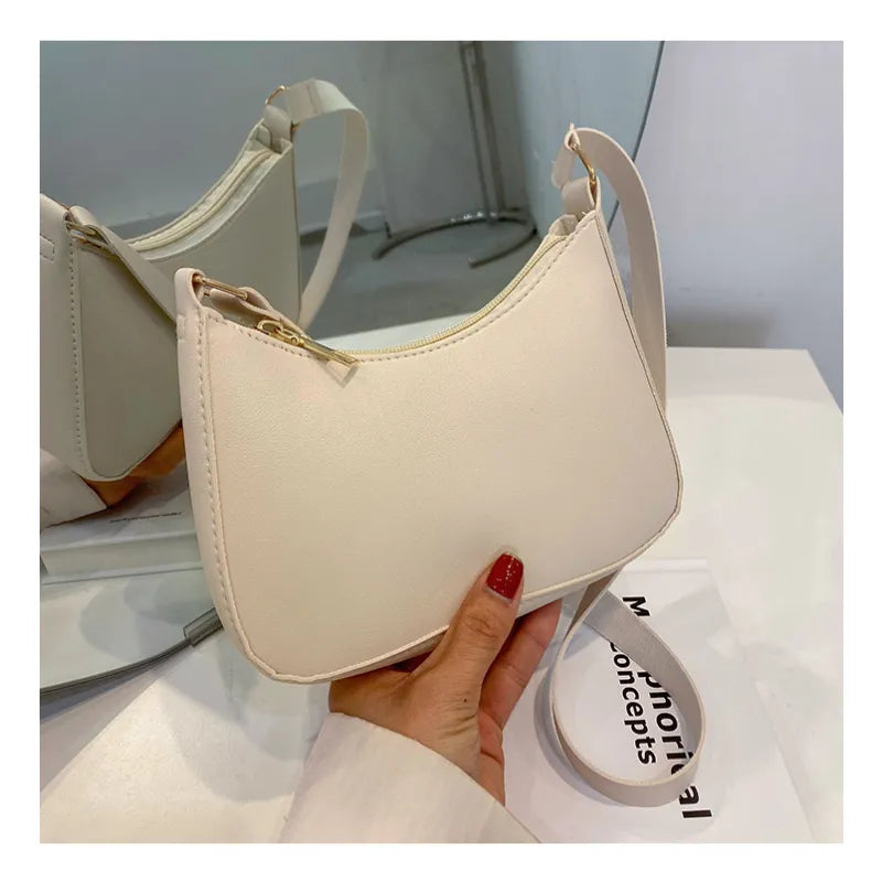 Kompakte Umhängetasche für Damen ⎜ Leichte Halbmondtasche in Pastell für Alltag und Freizeit