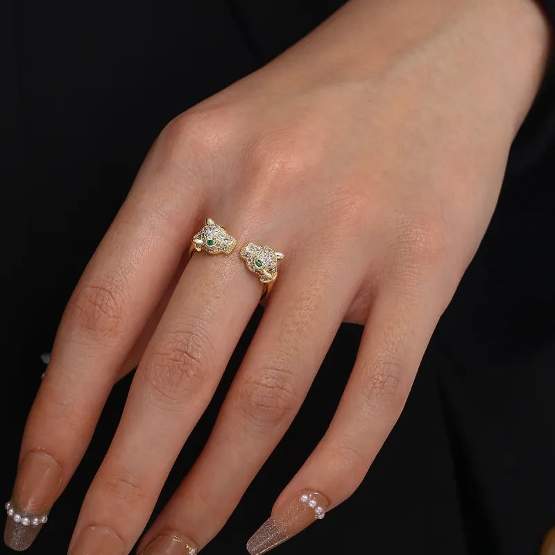 Tigerköpfen-Ring in Goldoptik ⎜ Offenes Design mit grünen Augen und Zirkonia für ausdrucksstarke Looks