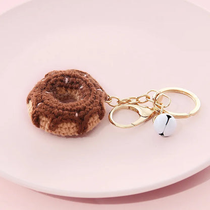 Donut Anhänger aus Wolle ⎜ Handgehäkelter Taschenanhänger mit Glocke für den Rucksack