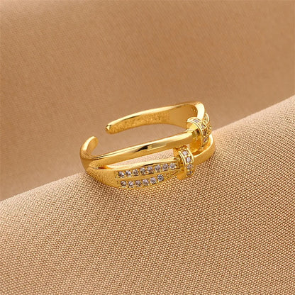 Ring in Goldoptik mit Zirkonia ⎜ Verstellbarer Bandring mit elegantem Schleifen-Design für stilvolle Auftritte